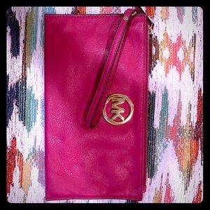 Pink Micheal Kors envelope clutch